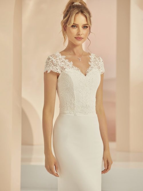 Bianco Evento. Blonde bolero model E347.